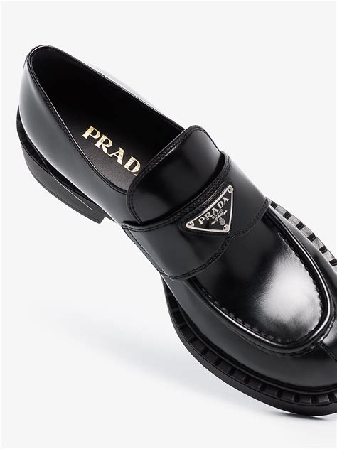 Shop Prada Logo Leather Loafers 